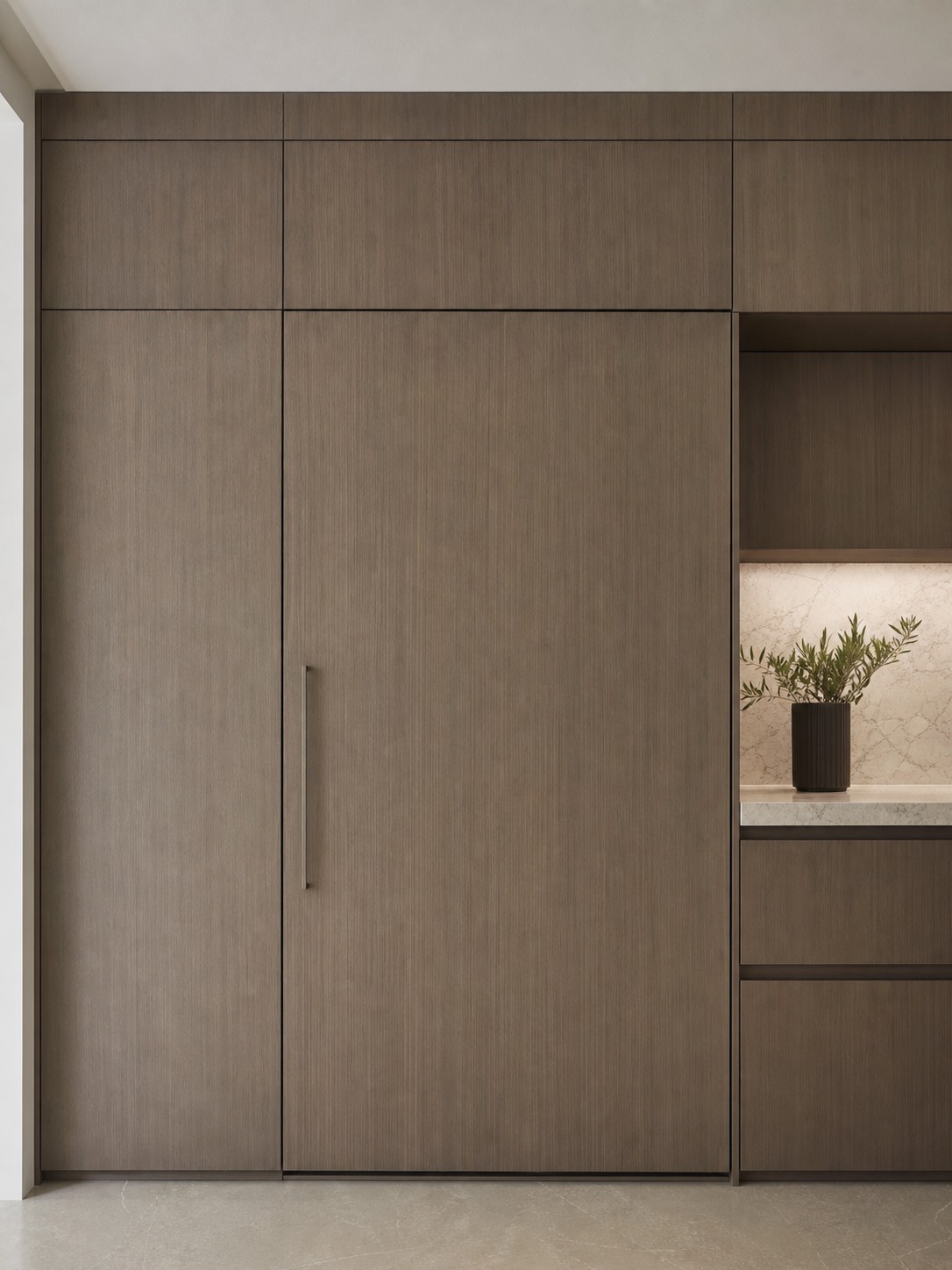 Panel-matched refrigerator flush with cabinetry Built-in panel-matched refrigerator set flush with surrounding cabinetry for an uninterrupted wall line. | Sky Rye Design Built-in panel-matched refrigerator set flush with surrounding cabinetry for an uninterrupted wall line.