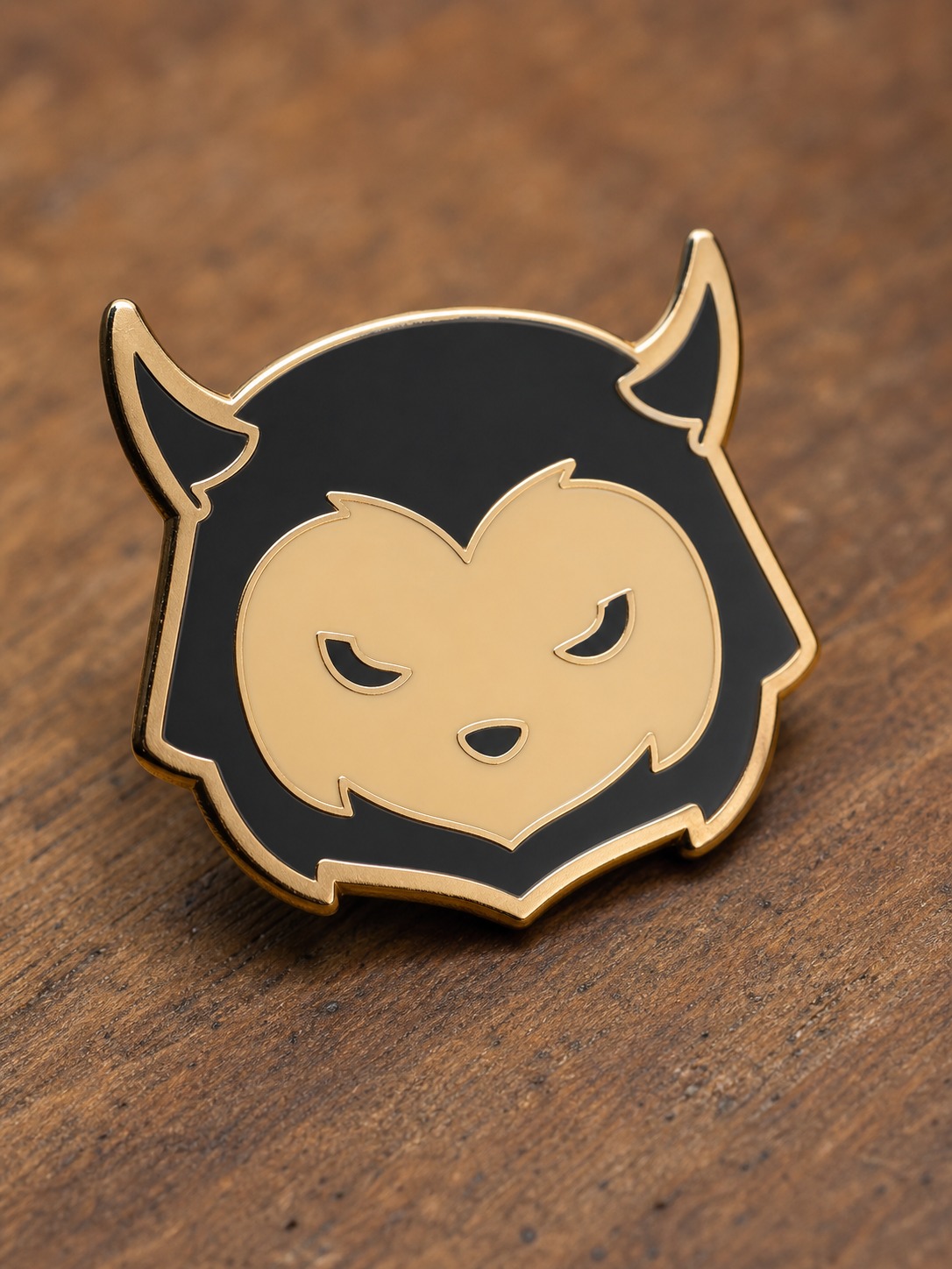 Simplified enamel pin design A close-up enamel pin with a simplified flat-color mascot-style design. | Sky Rye Design A close-up enamel pin with a simplified flat-color mascot-style design.