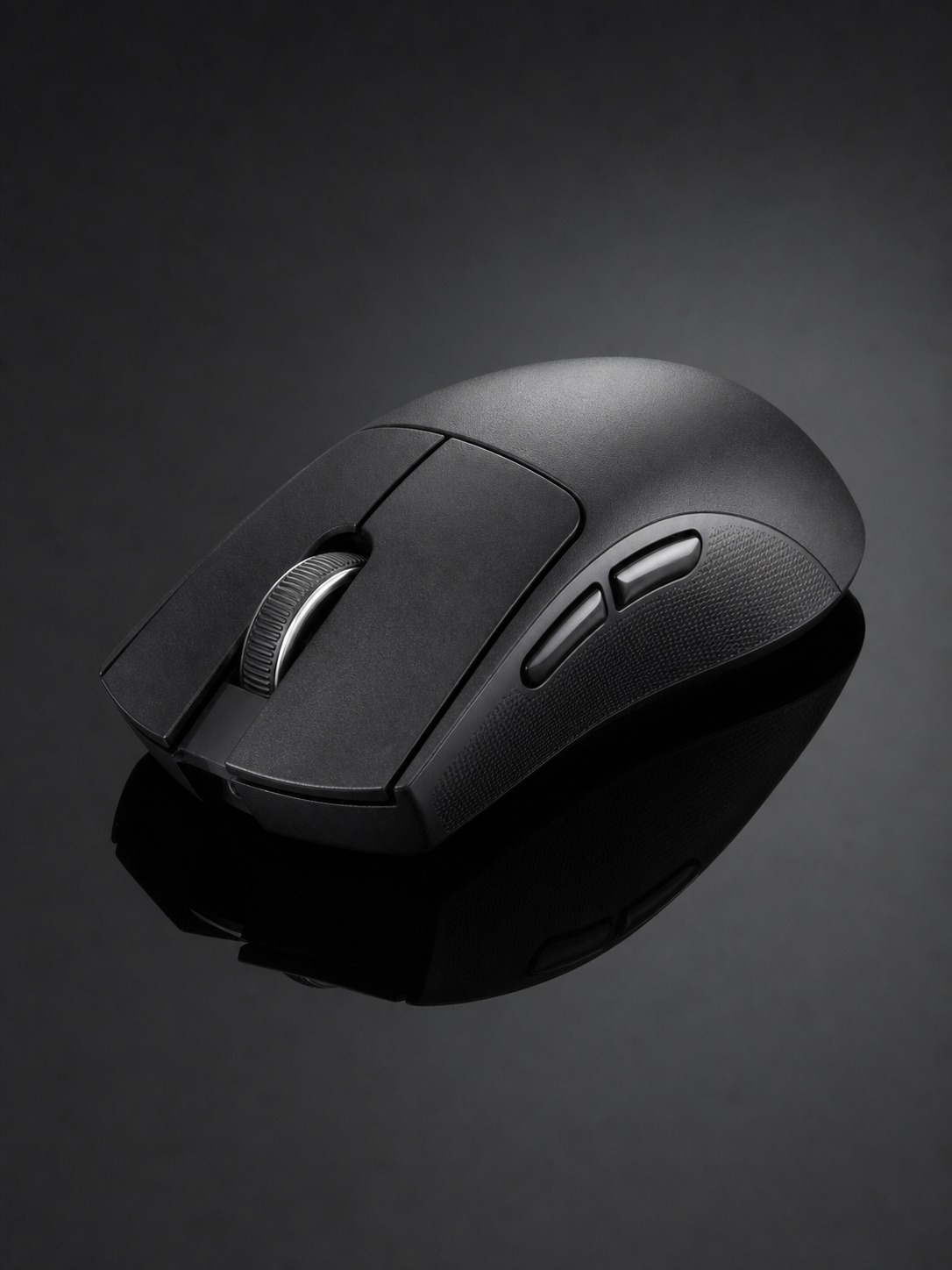 Wireless gaming mouse photographed at a three-quarter angle on a dark reflective surface
