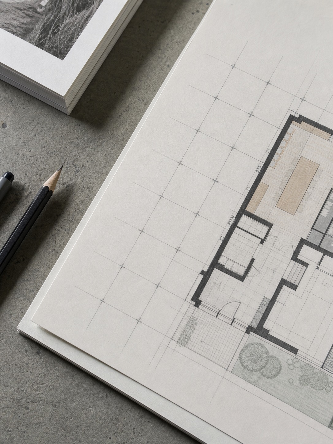 Portfolio floor plan page with a faint pencil grid overlay