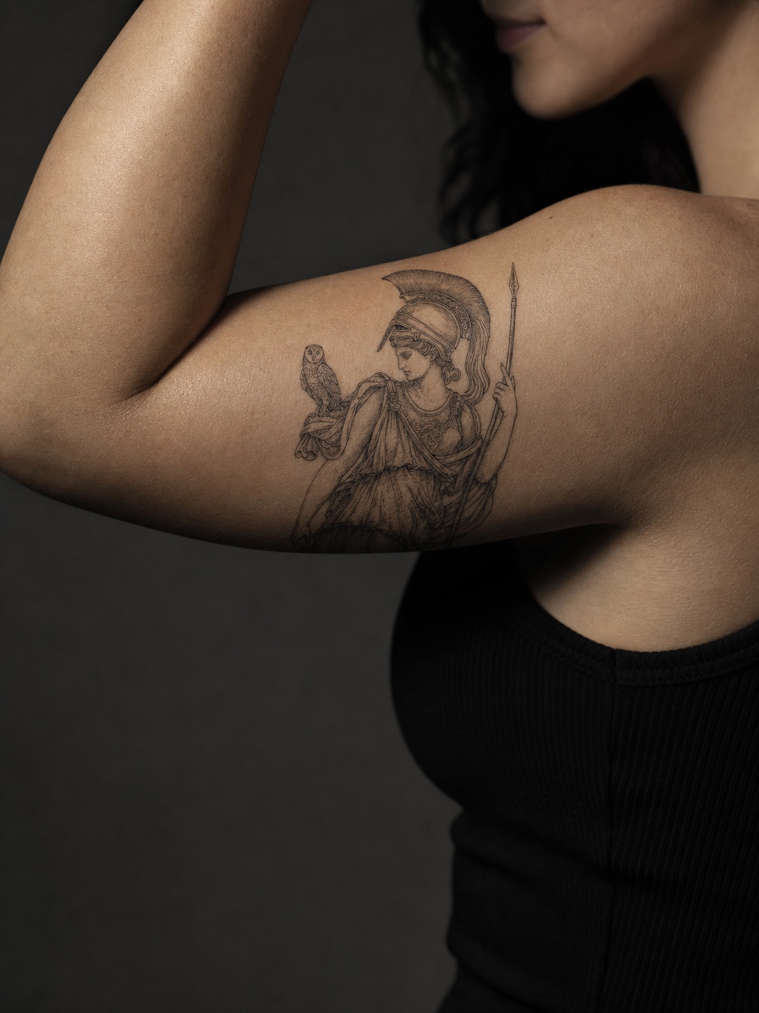 Athena contrapposto upper arm tattoo Athena tattoo with helmet and owl on an upper arm, drawn in classical fine-line style. | Sky Rye Design Athena tattoo with helmet and owl on an upper arm, drawn in classical fine-line style.