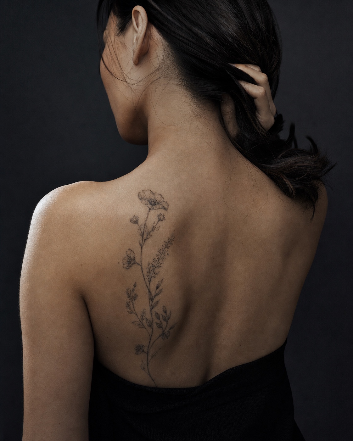 Botanical dotwork upper back tattoo Botanical dotwork tattoo on the upper back with fine wildflower stems and stippled petals. | Sky Rye Design Botanical dotwork tattoo on the upper back with fine wildflower stems and stippled petals.