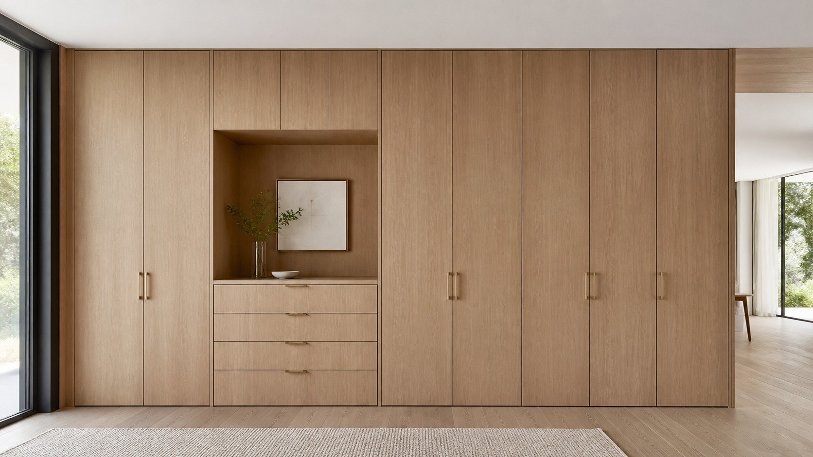 Floor-to-ceiling built-in storage wall Seamless floor-to-ceiling built-in storage wall with flush cabinet doors and warm wood detailing. | Sky Rye Design Seamless floor-to-ceiling built-in storage wall with flush cabinet doors and warm wood detailing.
