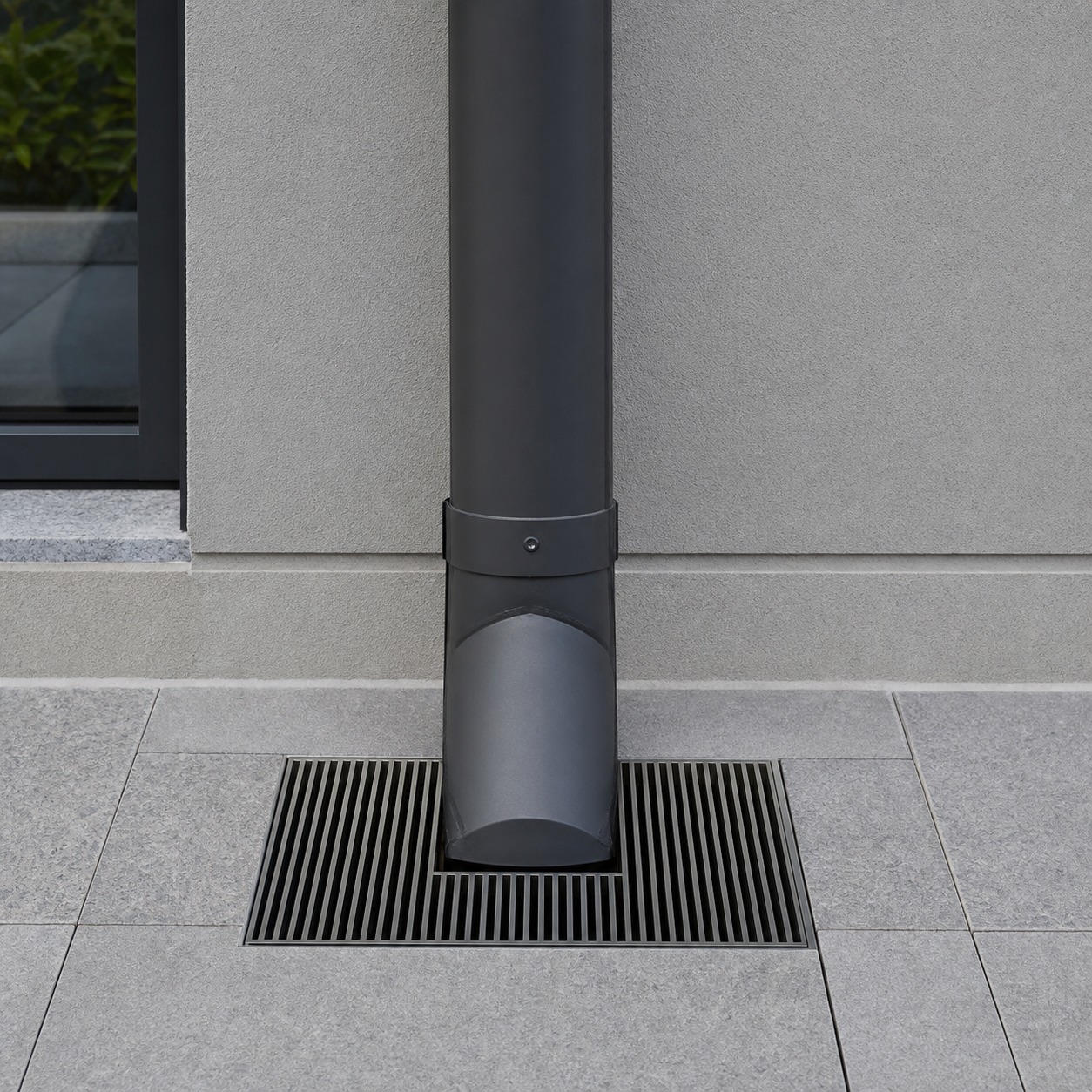 Flat Roof Downpipe and Ground Drainage Detail Downpipe base and drainage grate integrated into hard landscaping. | Sky Rye Design Downpipe base and drainage grate integrated into hard landscaping.