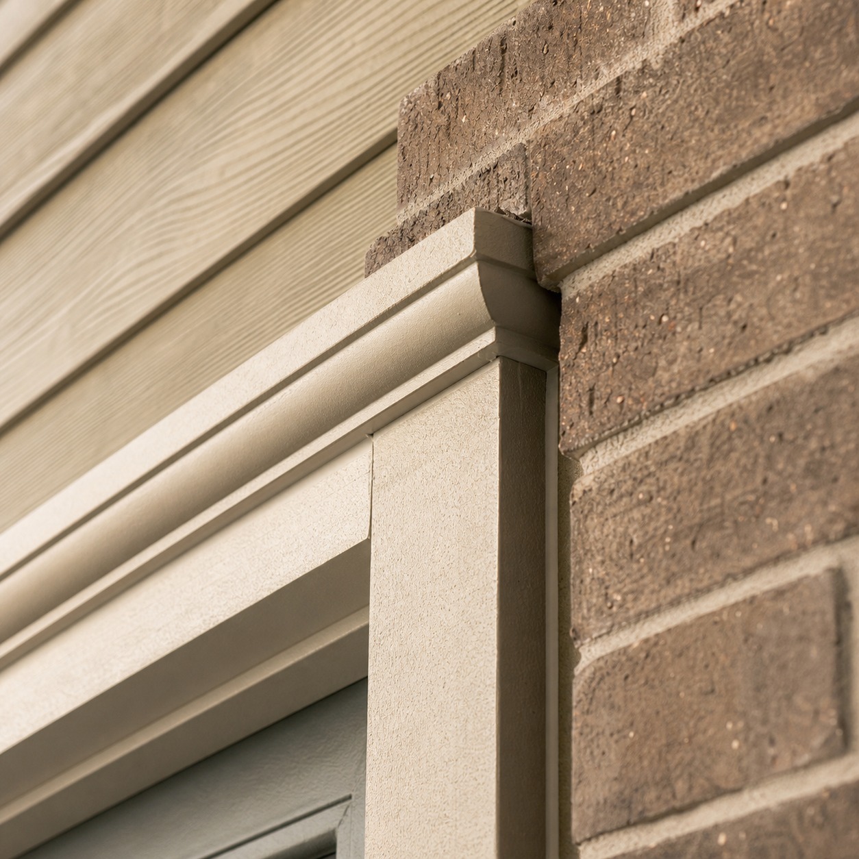 Front door trim and brick molding reveal Close view of front door brick molding and casing meeting exterior siding with a clean reveal line. | Sky Rye Design Close view of front door brick molding and casing meeting exterior siding with a clean reveal line.