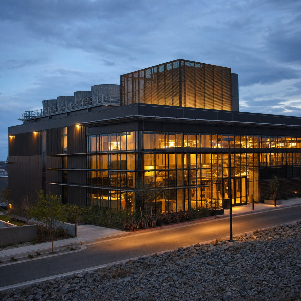 Industrial building at dusk with integrated mechanical elements Industrial building at dusk with integrated mechanical elements | Sky Rye Design Industrial building at dusk with integrated mechanical elements