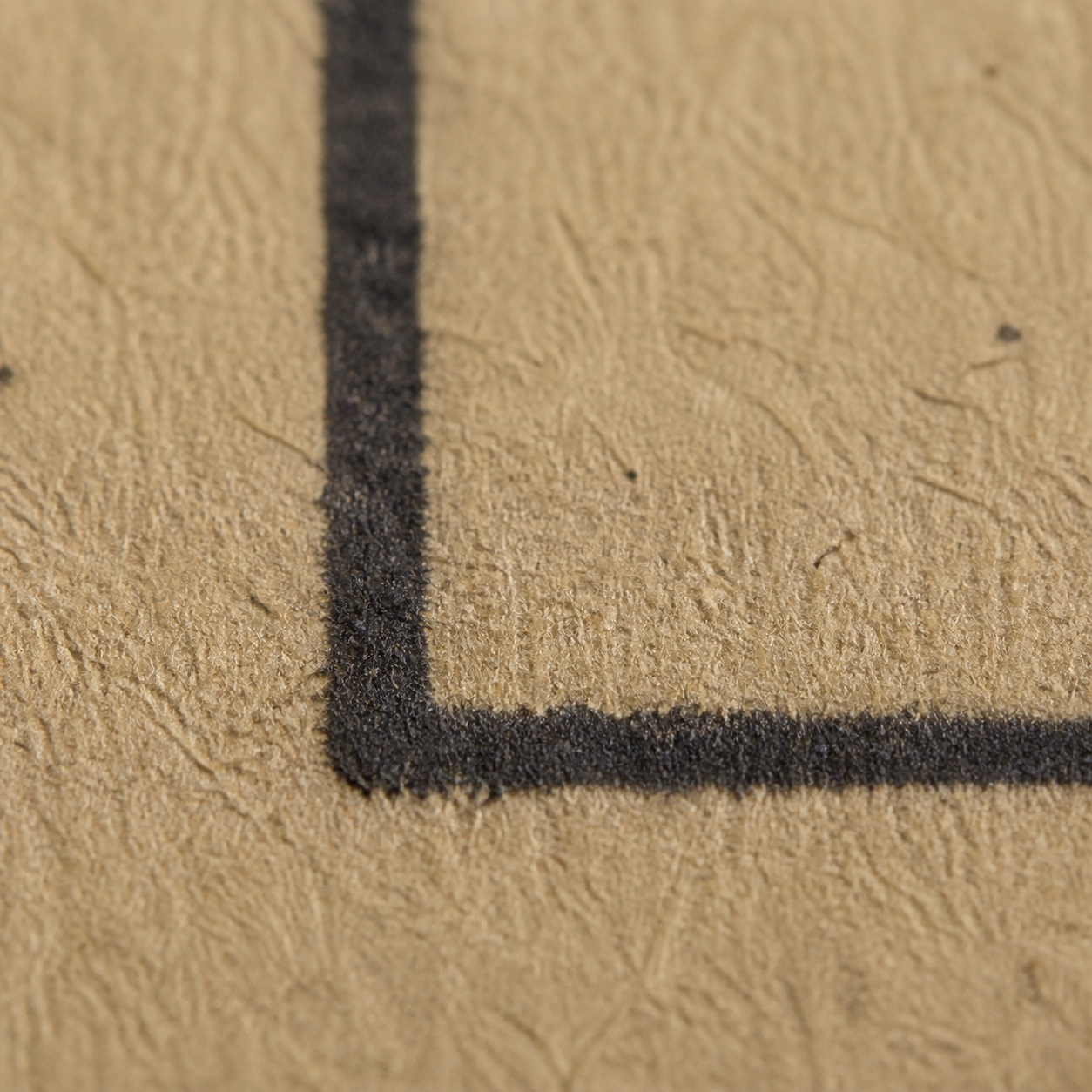 Kraft paper substrate and ink absorption Close view of kraft paper fibers and ink absorption along a printed line. | Sky Rye Design Close view of kraft paper fibers and ink absorption along a printed line.