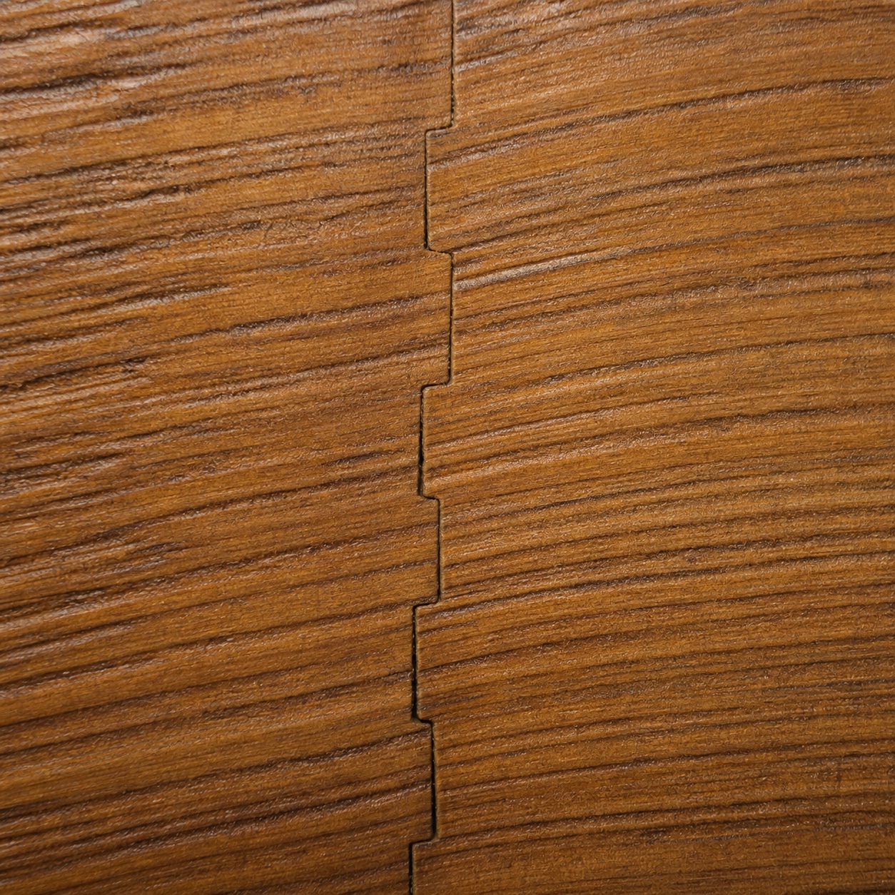 Matched grain direction across a scarf joint Macro detail of timber grain continuing across a scarf joint seam with subtle color variation and oil-finished texture. | Sky Rye Design Macro detail of timber grain continuing across a scarf joint seam with subtle color variation and oil-finished texture.