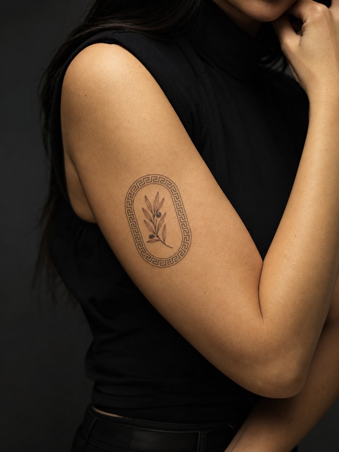 Meander framed olive branch upper arm tattoo Upper arm tattoo with an olive branch framed by a Greek key meander border. | Sky Rye Design Upper arm tattoo with an olive branch framed by a Greek key meander border.