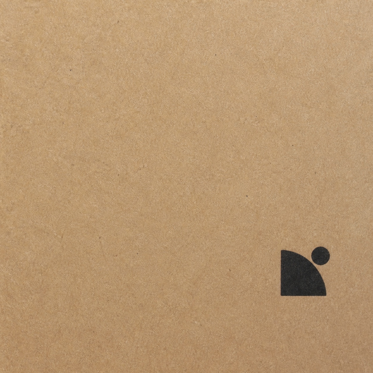 Minimalist kraft packaging with negative space Minimal paper carton using a small off-center mark and generous negative space. | Sky Rye Design Minimal paper carton using a small off-center mark and generous negative space.