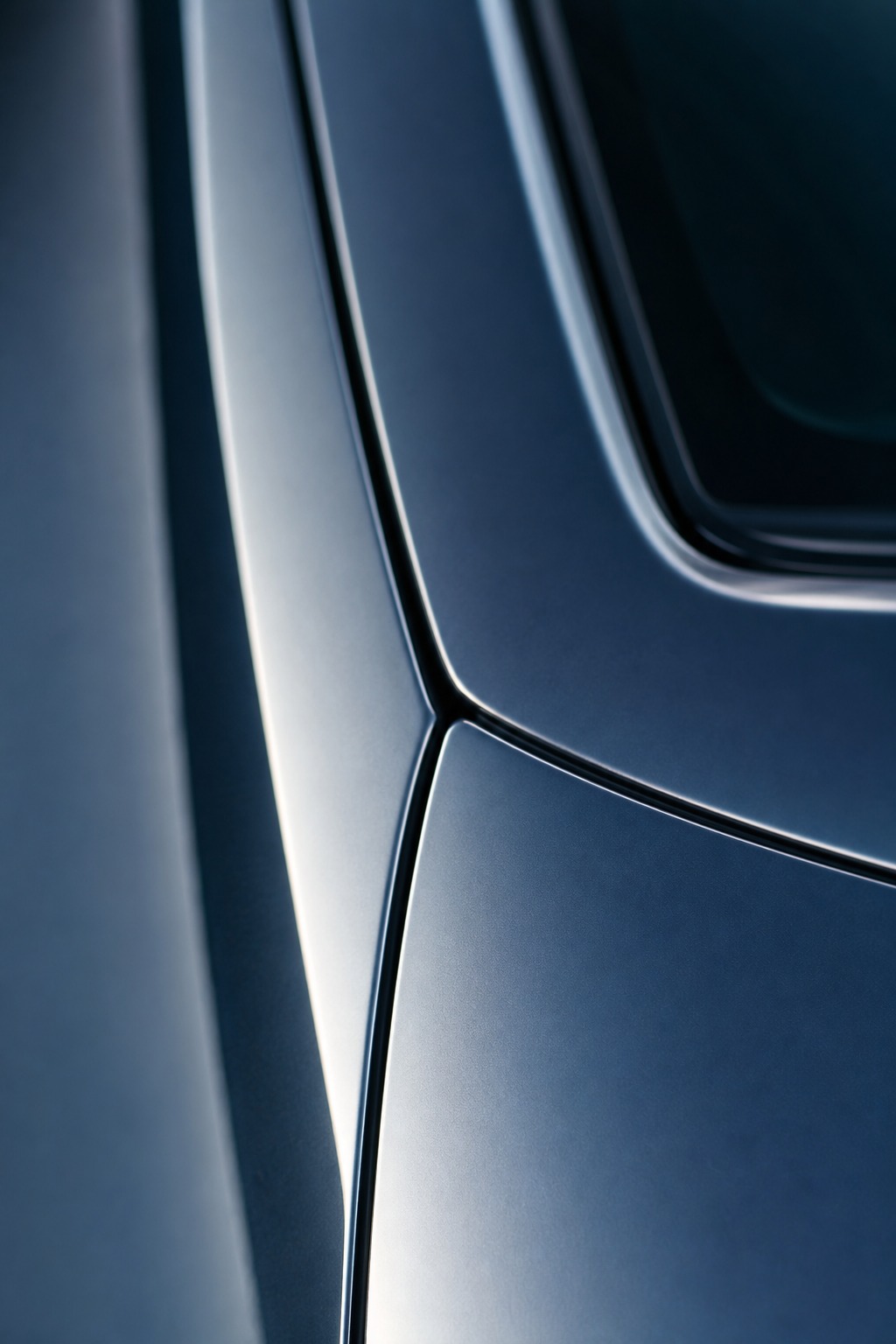 Stamped steel body panel transition A macro view of a stamped steel body panel transition with precise panel gaps and surface continuity. | Sky Rye Design A macro view of a stamped steel body panel transition with precise panel gaps and surface continuity.