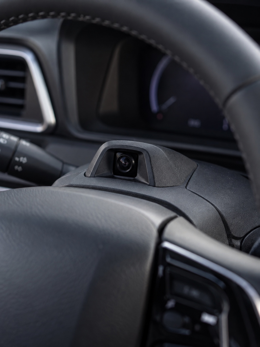 Driver Monitoring Camera in Steering Column Small driver monitoring camera integrated into a modern steering column | Sky Rye Design Small driver monitoring camera integrated into a modern steering column