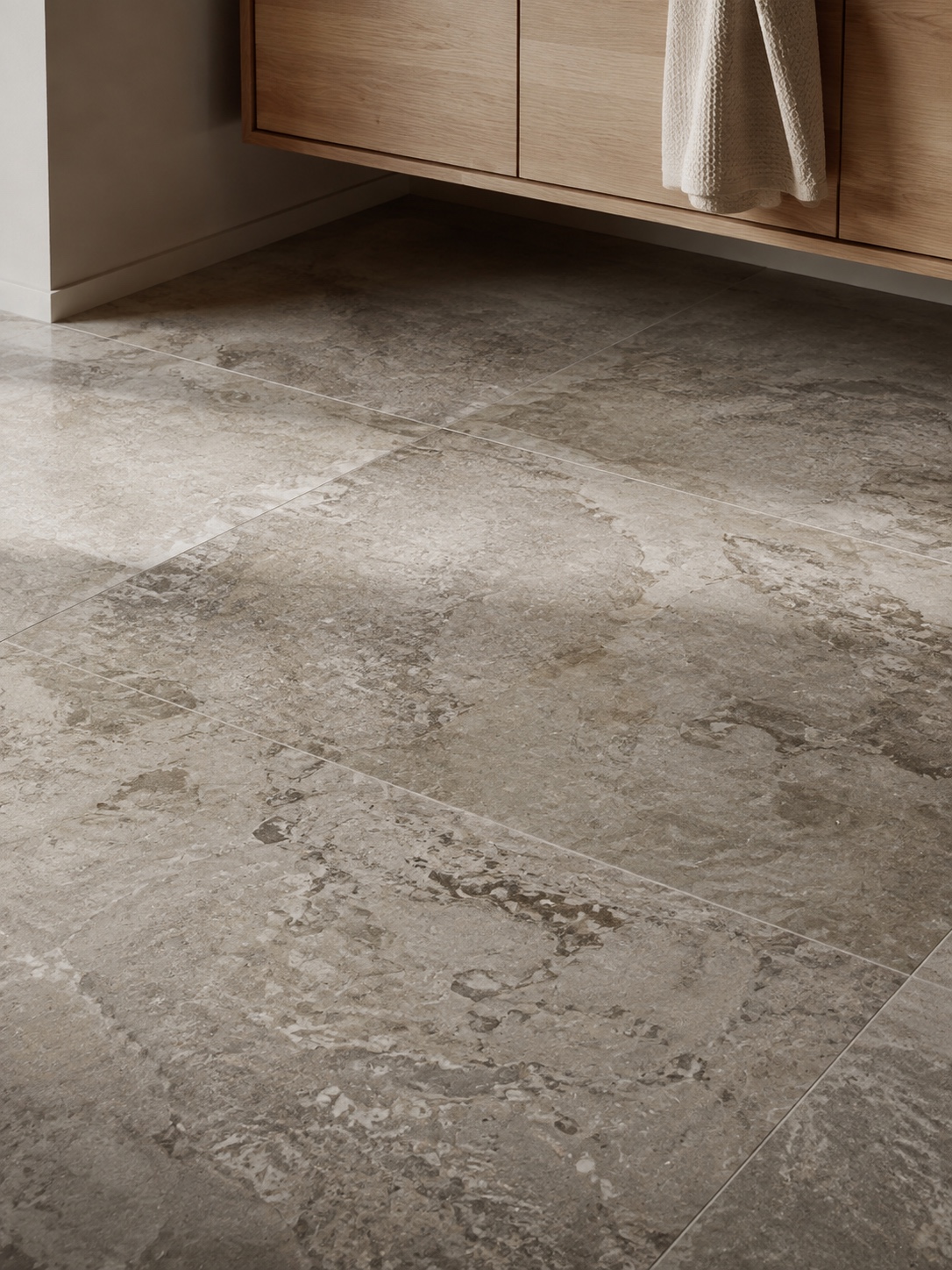 Durable Natural Stone Bathroom Flooring Close view of durable natural stone bathroom flooring with authentic veining. | Sky Rye Design Close view of durable natural stone bathroom flooring with authentic veining.