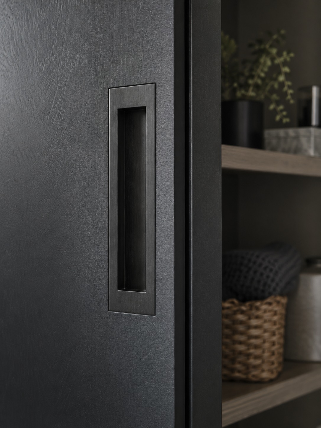 Flush black utility closet door pull Flush brushed black pull set into a modern utility closet door | Sky Rye Design Flush brushed black pull set into a modern utility closet door