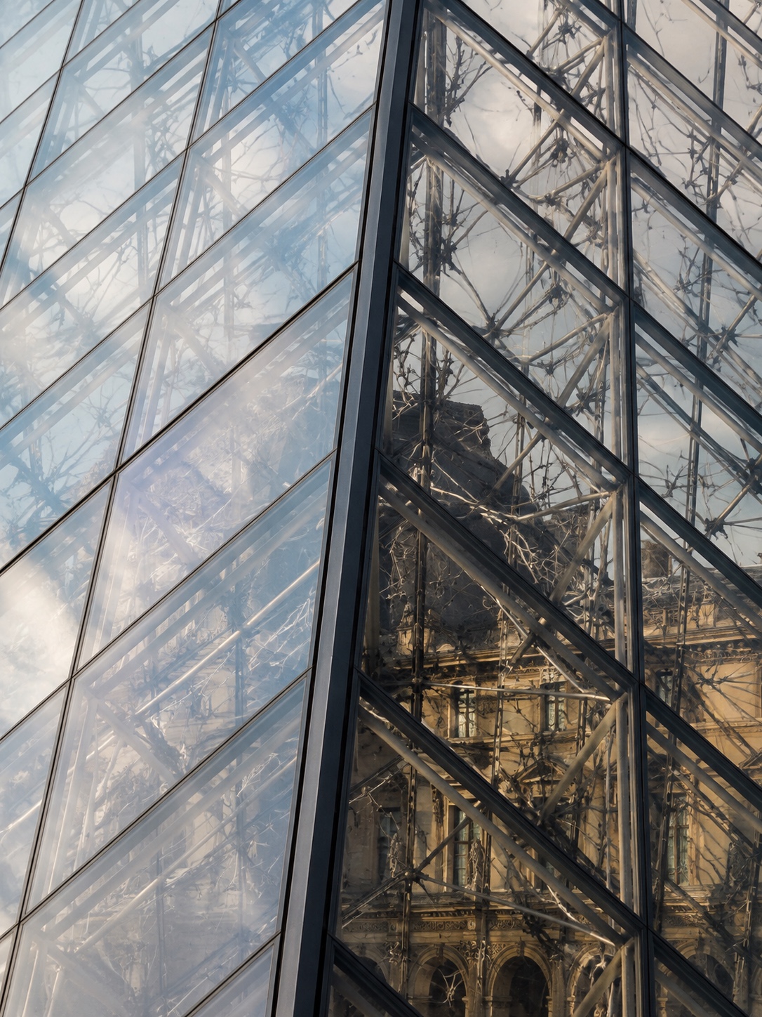 Louvre Pyramid Glass and Steel Grid Close detail of Louvre Pyramid glass panels and steel structural grid. | Sky Rye Design Close detail of Louvre Pyramid glass panels and steel structural grid.