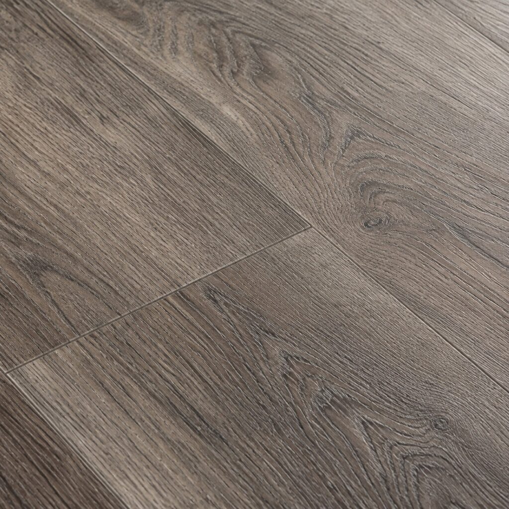 Luxury Vinyl Plank Wood Grain Detail A close detail of luxury vinyl plank flooring with realistic wood grain texture. | Sky Rye Design A close detail of luxury vinyl plank flooring with realistic wood grain texture.
