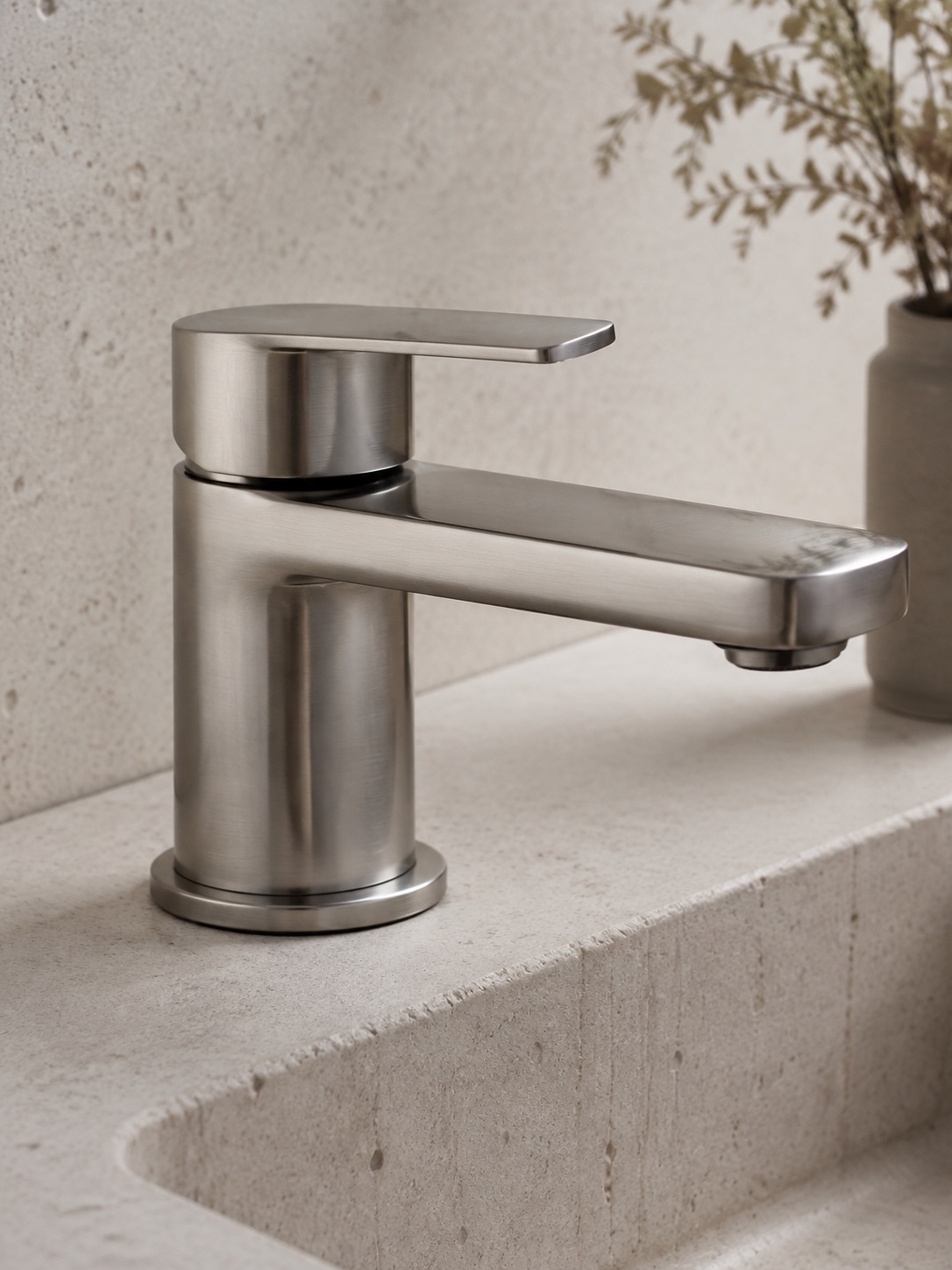 Minimalist Brushed Nickel Lever Faucet Detail Minimalist brushed nickel lever-handle faucet shown as a sculptural detail. | Sky Rye Design Minimalist brushed nickel lever-handle faucet shown as a sculptural detail.