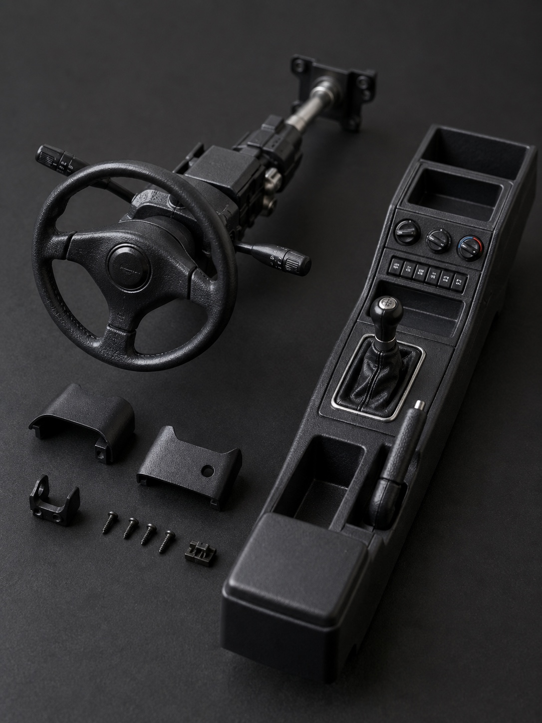 Model car steering column and center console Scale model steering column and center console laid out for final assembly | Sky Rye Design Scale model steering column and center console laid out for final assembly