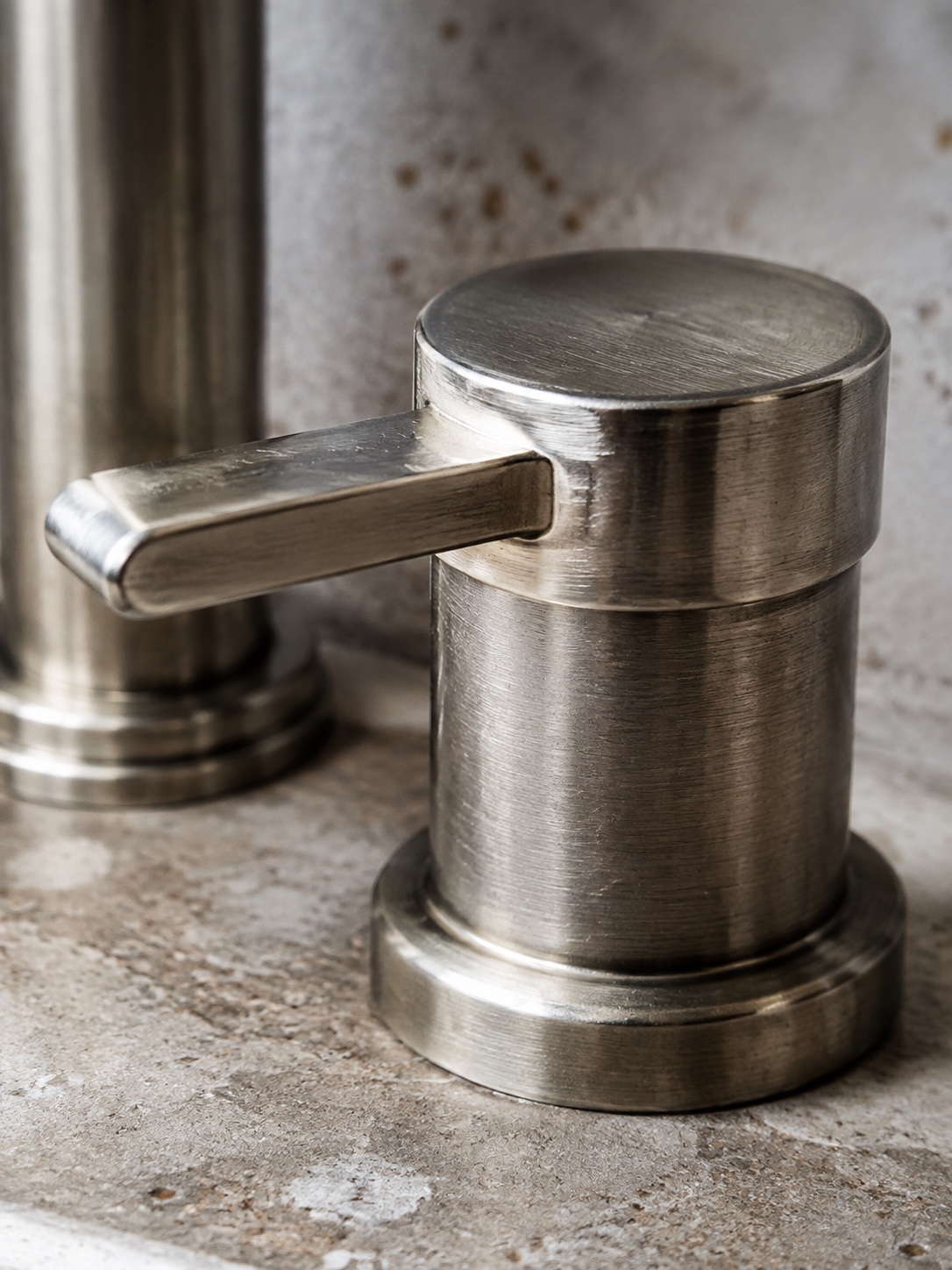 Recycled Metal Brushed Nickel Faucet Handle Brushed nickel faucet handle made with a recycled-metal look and fine surface texture. | Sky Rye Design Brushed nickel faucet handle made with a recycled-metal look and fine surface texture.