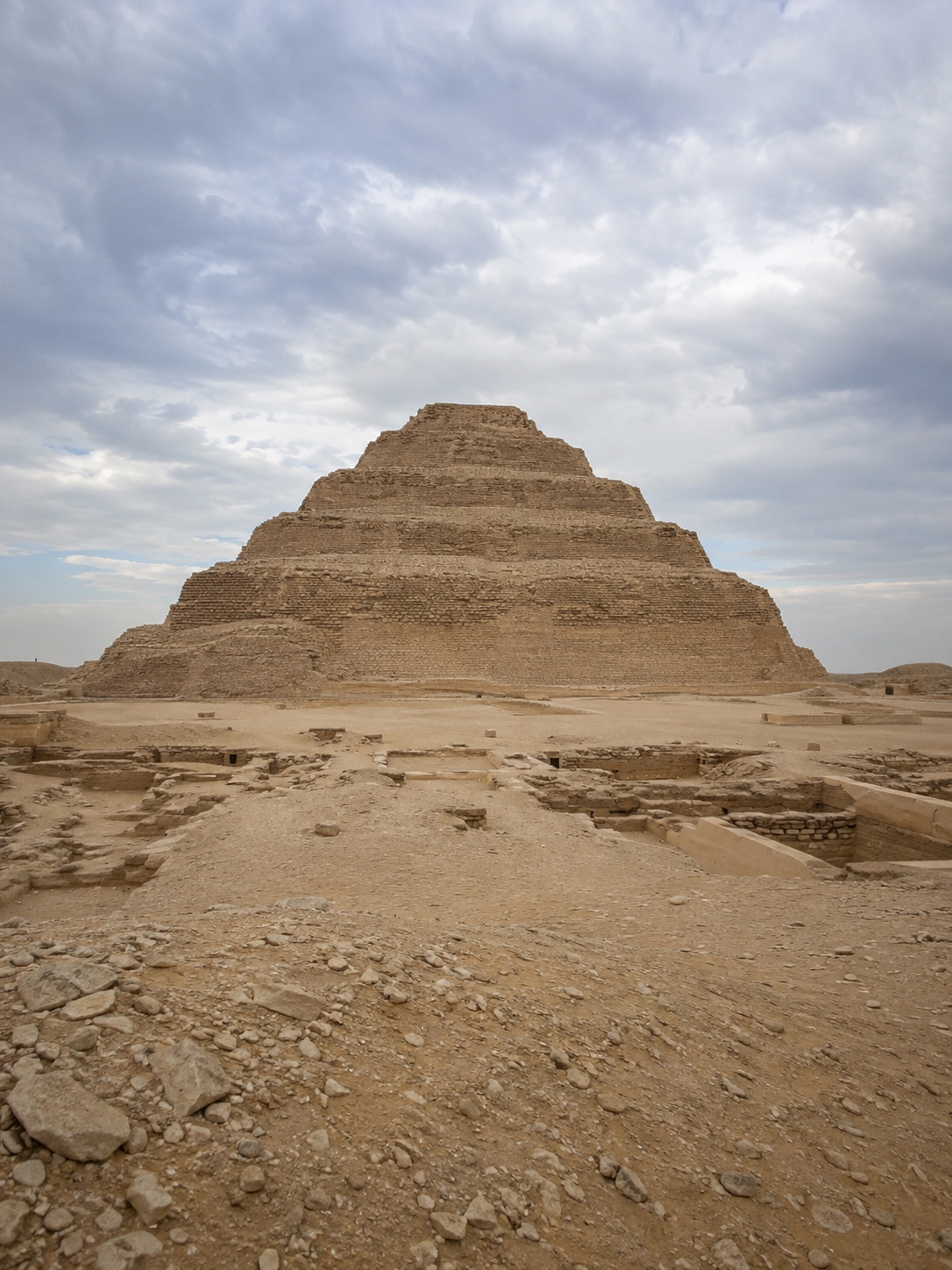 Stepped Pyramid of Djoser Six Tiers Stepped Pyramid of Djoser showing six tiers under soft desert daylight. | Sky Rye Design Stepped Pyramid of Djoser showing six tiers under soft desert daylight.