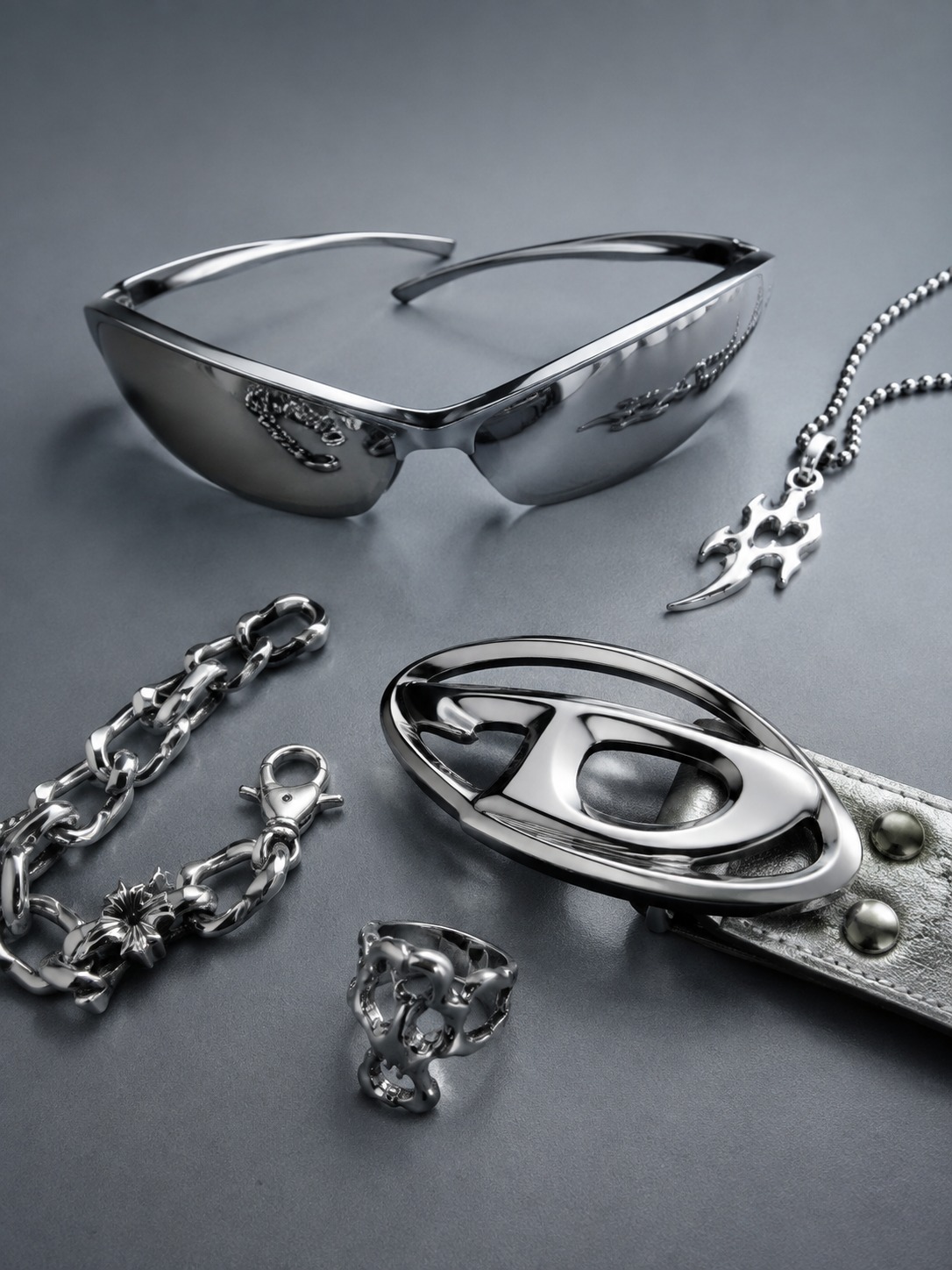 Futuristic chrome accessories Silver wraparound sunglasses, chrome buckle and metallic jewelry | Sky Rye Design Silver wraparound sunglasses, chrome buckle and metallic jewelry