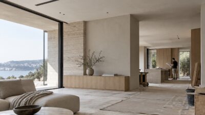 Modern living room renovation with a linear supply grille and planned service access